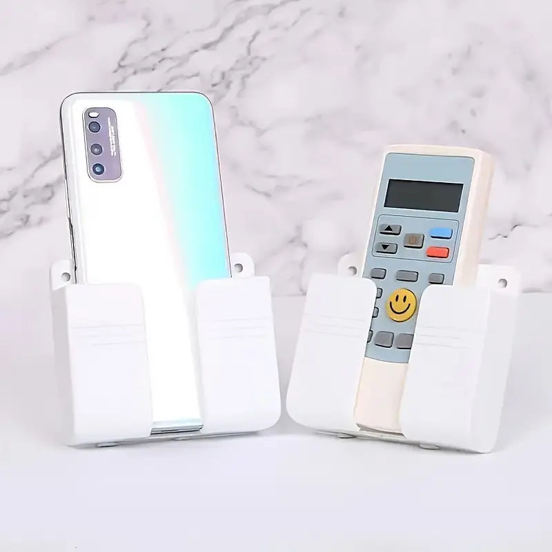 Suport adeziv de perete pentru telefon sau telecomandă