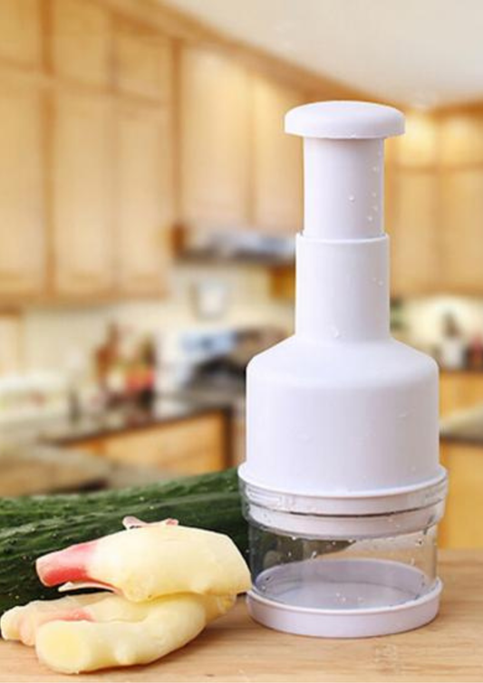 Tocător manual rotativ de legume