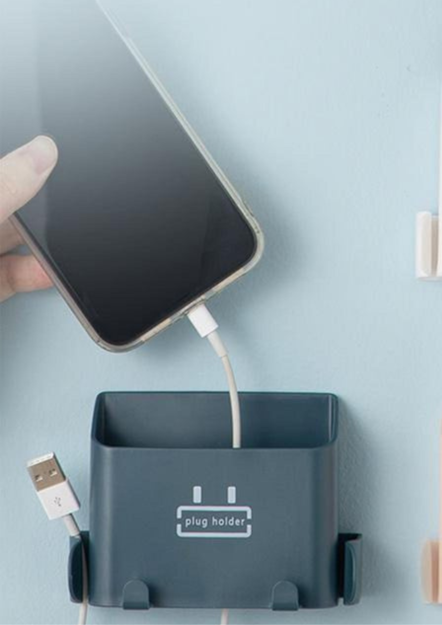 Organizator de perete pentru cabluri și telecomenzi