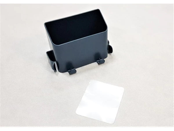 Organizator de perete pentru cabluri și telecomenzi