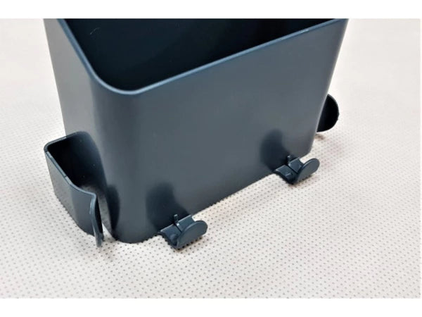 Organizator de perete pentru cabluri și telecomenzi